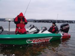 Castrol pro Carl Svebek checks one of his baits as he and co-angler Bryan Futch wait for checkout.