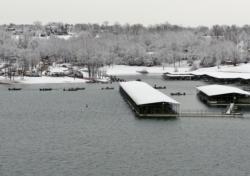 A thick blanket of snow blanketed Lake Norfok Marina at the day two boat check.