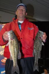 Frank Divis, Sr., of Fayetteville, Ark., now leads the Co-angler Division of the FLW Tour event on Lewis Smith Lake with a two-day total of 20-1.