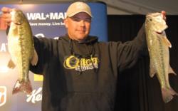 Pro Jason Reyes of Humble, Texas, is in second place with five bass weighing 14 pounds.