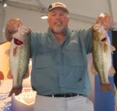 Dennis Price of Tinley Park, Ill., leads the Co-angler Division of the FLW Tour event on Fort Loudoun-Tellico lakes with five bass weighing 13 pounds, 3 ounces.
