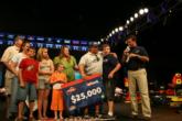 It was a family affair when Barry Isbell accepted his co-angler winnings.