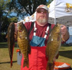 Michael Tanksley of Crossville, Tenn., leads the Co-angler Division with a limit weighing 18 pounds, 14 ounces.