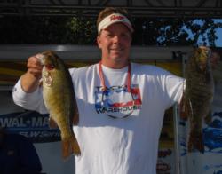 Sam Mitchiner of Garner, N.C., leads the Co-angler Division of the FLW Series on Lake Champlain with 35 pounds, even.