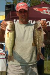 Day-two co-angler leader Alan Hults of Gautier, Miss., proudly displays part of his two-day 19-pound, 5-ounce catch.