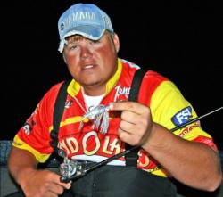 Too much company forced pro leader Michael Wooley out of his main area on day three, but he found new water that he