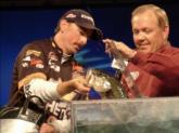 Using his homemade spinnerbait, pro Ricky Scott caught a 12-pound, 15-ounce limit Friday.