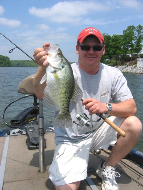 FLW Outdoors Magazine Creative Director Brian Lindberg lands a crappie on Kentucky Lake.