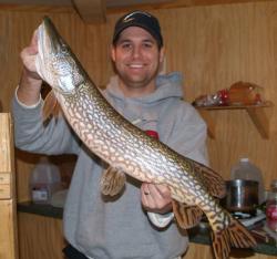 In addition to great walleye fishing, a bonus pike is possible on a trip to Upper Red Lake. This fish measured 33 inches. 