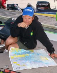 Minnesota pro Jim Moynagh dissects a lake map in hopes of finding the winning area.