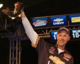 Second-place pro Andy Morgan holds up his kicker bass from day four on Lake Norman.