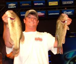 Dickson Adams of Woodstock, Ga., is in first place in the Co-angler Division after day one of the All-American with limit weighing 11-14.