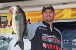 Pro Cody King of Island City, Ore., shows off a 5-pound, 9-ounce largemouth bass en route to a total catch of 34 pounds, 2 ounces. King heads into the Columbia River finals in sixth place.