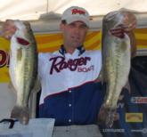 Alan Hults of Gautier, Miss., now leads the Co-angler Division of the FLW Series on Lake Dardanelle with a two-day total of 22 pounds, 9 ounces.