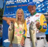 BP pro Ray Scheide of nearby Dover, Ark., moved into the second place spot on day two with a three-day total of 27 pounds, 9 ounces. Here he gets a little help from his daughter showing off his catch.