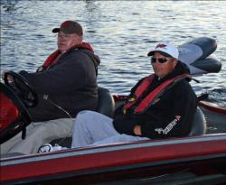 Co-angler leader JR Wright, right side, fishes with Delta flipping legend Dee Thomas today.