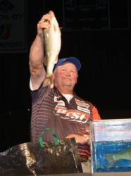 Third-place pro David Andersen holds up a nice Missouri River walleye.