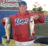 Chuck Rounds of Benton, Ky., shows off his winning fish.