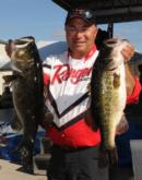 Bob Izumi of Milton, Ontario, shot to fourth place today with an 18-13 catch, which gives him a two-day total of 34-6.