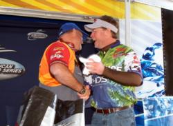 Second-place co-angler Bo Standley congratulates Keith Honeycutt on his win.