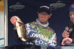 Co-angler Brent Houlihan of Naples, Fla., shows off his final-day catch on Lake Okeechobee. Houlihan ultimately finished the American Fishing Series event in fourth place.