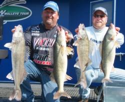 Pro Dan Stier and co-angler Rich Carmack hold up their day-three catch.