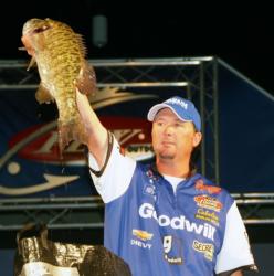 Second-place pro Chad Grigsby holds up a monster smallmouth he caught on day four of the Fort Loudoun-Tellico event.
