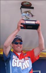Bill Shimota holds up his trophy for winning the first Western Division event of the 2010 season.