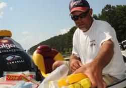 Folgers pro Scott Suggs, who has won a Forrest Wood Cup on Lake Ouachita, grabs his marker buoys for deep-water combat.