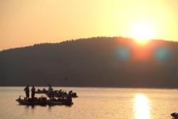 FLW Tour anglers patiently await the start of takeoff as the sun rises over Lake Ouachita.