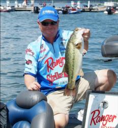Second-place pro Mark Rose holds up one of his five keepers from day two on Lake Guntersville.