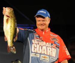 Mark Rose holds up his kicker bass en route to finishing second at Lake Guntersville.