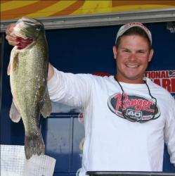 Second place co-angler John Woodroof caught the biggest fish of his division, a 5-11.