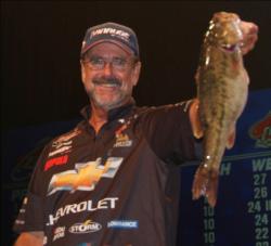 Second-place pro Larry Nixon holds up a Lanier spot that weighed nearly 5 pounds.