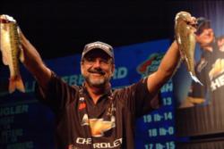 Legendary angler and Chevy pro Larry Nixon shows off his catch.