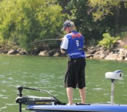 Kevin Hawk fights a fish to the boat on day four of the Forrest Wood Cup.
