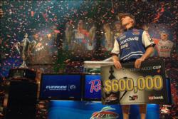 As confetti pours down from the rafters, pro Kevin Hawk of Ramona, Calif., soaks in the moment shortly after wining the 2010 Forrest Wood Cup title on Lake Lanier.