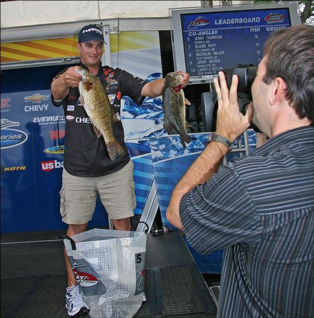 Chevy pro Anthony Gagliardia shows off part of his catch for the TV camera.