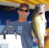 Chris Weber of Fort Meyers Beach, Fla., is in third place after day one after fooling this 7-4 brute.