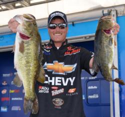 Chevy pro Bryan Thrift shows off his two Lake Okeechobee bass.