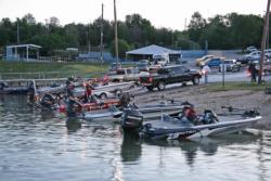 Anglers in later flights await the morning takeoff, as others launch at the Highport Marina ramp.