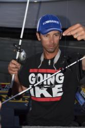 Day-three pro leader Michael Iaconelli preps his baits during the early morning hours before takeoff on the Potomac River.