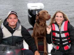 First place pro Adrian Avena and top co-angler Emily McLeod get a visit from Avena