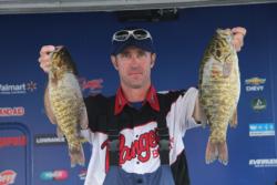 Day-one leader Jeff Hippert slipped to second on day two, but he trails by only 5 ounces.