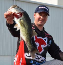 Fifth-place pro Cody Meyer holds up his kicker fish from day two on Lake Ouachita.
