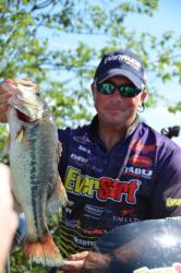 Second-place Cup finisher Randall Tharp gives a sneek peek of his catch before final weigh-in.