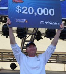 For winning the FLW Tour event on Lake Champlain, co-angler Casey Martin earned $20,000. 