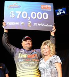 EverStart pro Dan Stier, pictured with his wife, Carmen, earned $70,000 for winning the National Guard FLW Walleye Tour Championship on the Missouri River. 