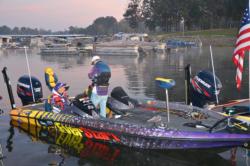 College anglers make some last-minute preparations before takeoff.