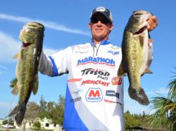 Fourth-place pro Art Ferguson III holds up part of his 20-pound, 4-ounce catch.